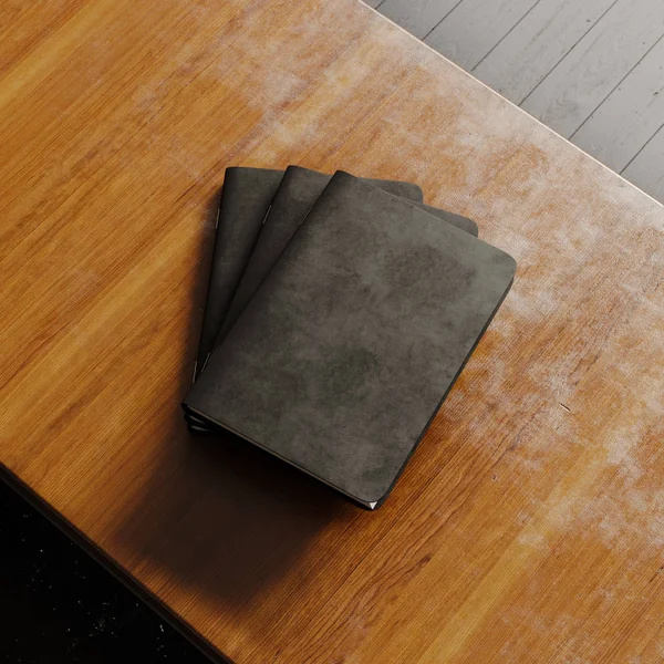 Concept of three blank notebook with black textured paper cover on wooden desk. Empty horizontal mockup.Top view. 3d rendering — Stock Photo, Image