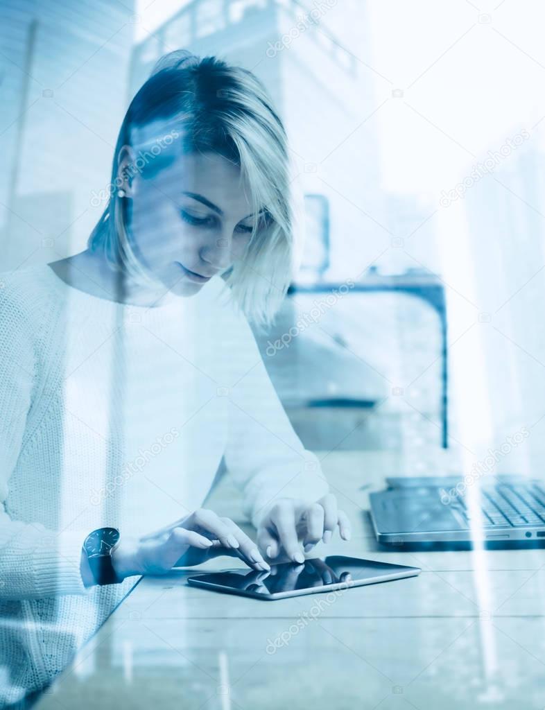 young woman using tablet