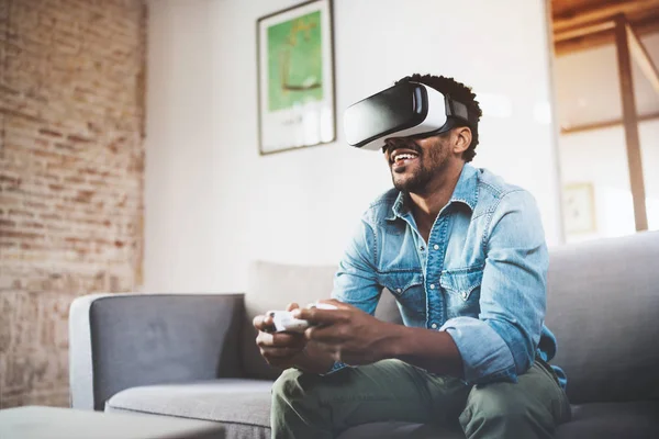 African man enjoying virtual glasses — Stock Photo, Image