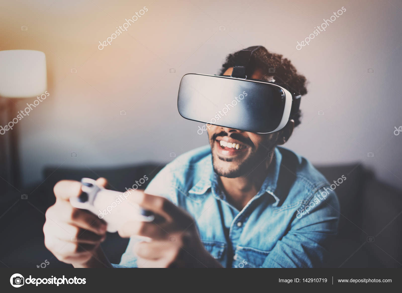 African man enjoying virtual reality — Stock Photo © kantver 142910719