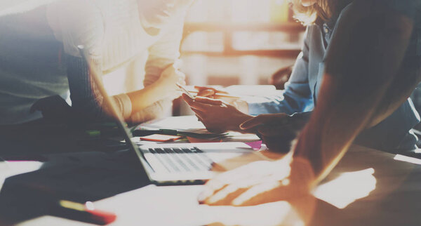 Group of young coworkers working together