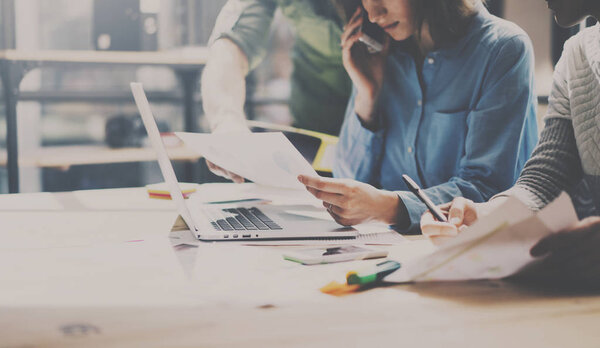Group of young coworkers working together