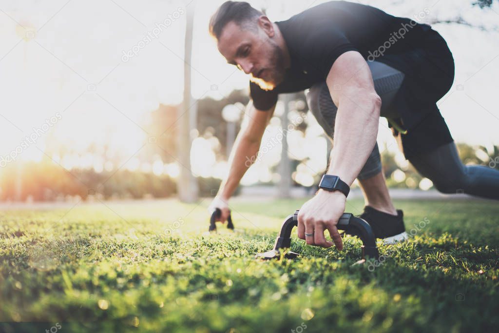 athlete exercising push up outside 