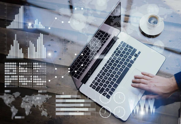 Businessman working at office on laptop at table. — Stock Photo, Image