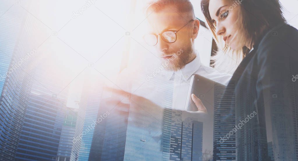 business team in working process and skyscrapers 