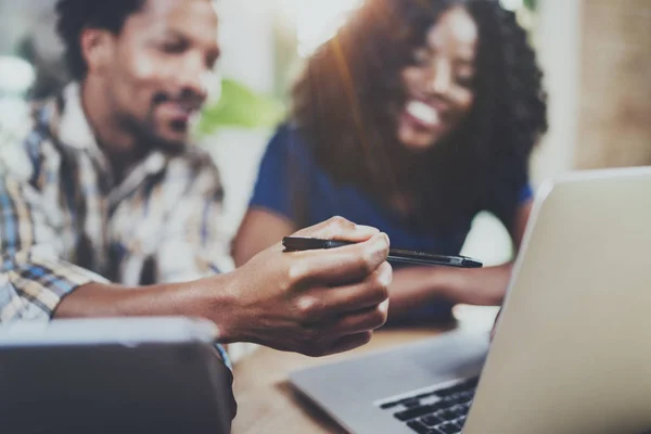 Couple working together at home