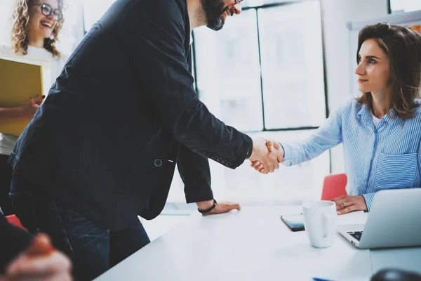 Concept two coworkers handshaking process.Business partnership handshake.Successful deal after great meeting.Blurred background. — Stock Photo, Image