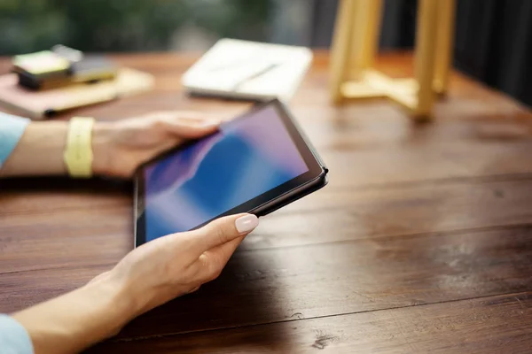 Woman pointing on digital tablet screen, chatting in social netw Stock Image