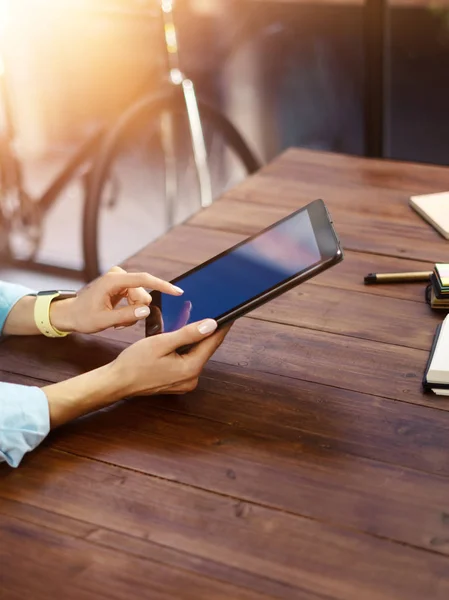 Woman pointing on digital tablet screen, chatting in social netw Stock Image