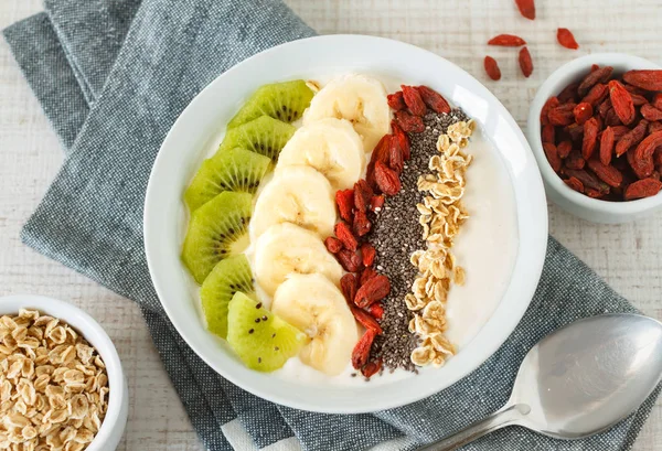 Yogurt with fruits, oats and chia seed — Stock Photo, Image