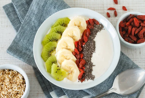 Yogurt with fruits, oats and chia seed — Stock Photo, Image