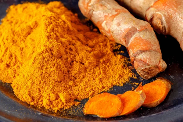 Oriental colorful mix of fresh and dry turmeric — Stock Photo, Image