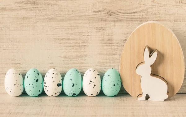 Easter still life with painted eggs and rabbit toy — Stock Photo, Image