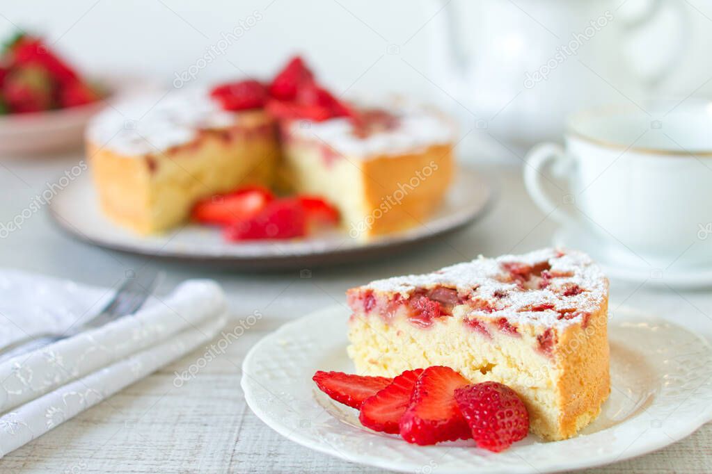 Homemade rustic cake made with fresh strawberries