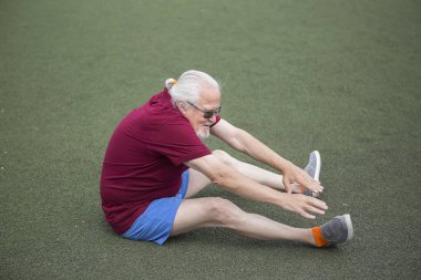 Komuta sizde açık bir stadyumda egzersiz