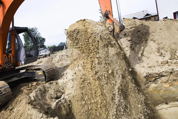 Escavadeira no canteiro de obras. — Fotografia de Stock