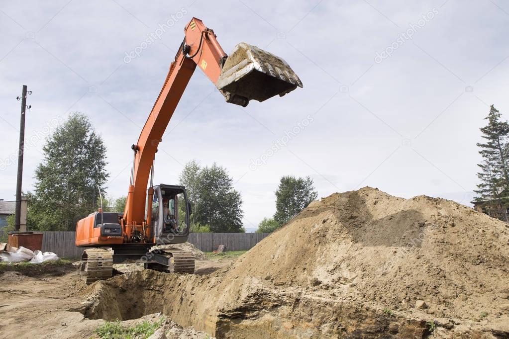 Excavator at the construction site.