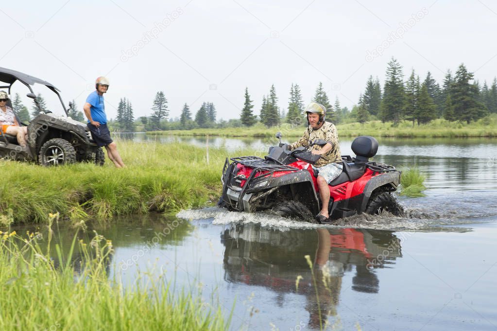 Tourists on all-terrain vehicles. On ATV