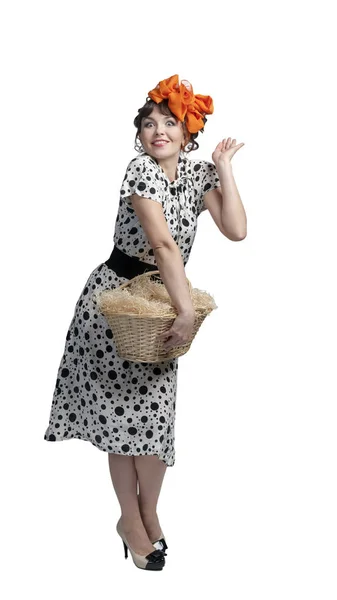 Young girl holding a basket — Stock Photo, Image