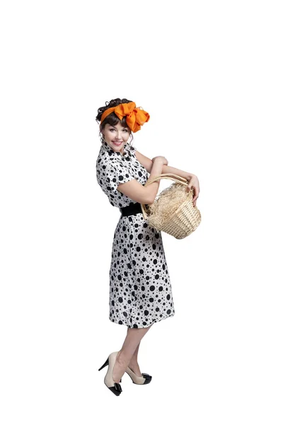 Young girl holding a basket — Stock Photo, Image