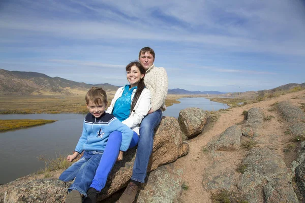 Happy family is resting in the mountains — Stock Photo, Image