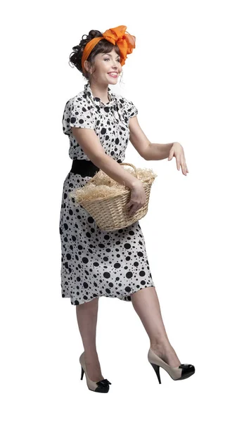 Young girl holding a basket — Stock Photo, Image