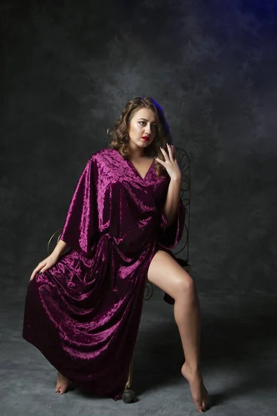 Girl draped in velvet — Stock Photo, Image