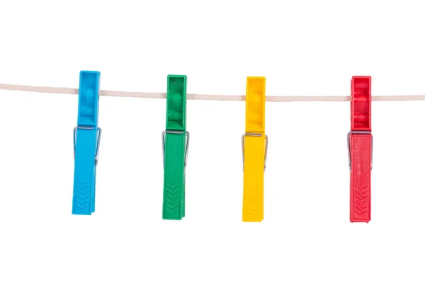 Color clothespins on rope — Stock Photo, Image