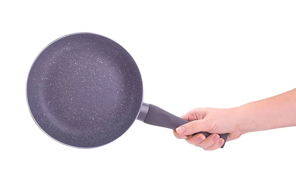 Hand holding clean empty pan — Stock Photo, Image