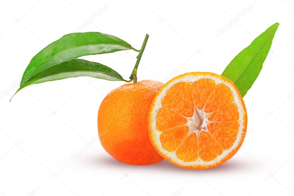 tangerine or mandarin fruit whole and cut in half with green lea