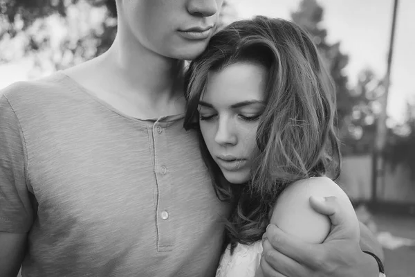 Sad Woman Hugging Her Boyfriend Looking Couple Problems Concept Black — Stock Photo, Image