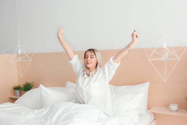 Young Woman Stretching Out Sitting Her Bed — Stock Photo, Image