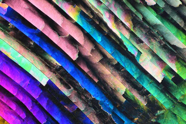 Microcristales coloridos en luz polarizada. Foto a través de un micrófono —  Fotos de Stock