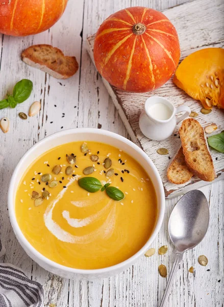 Bowl Pumpkin Carrot Cream Soup Seeds Basil Leaf Vegetarian Homemade — ストック写真