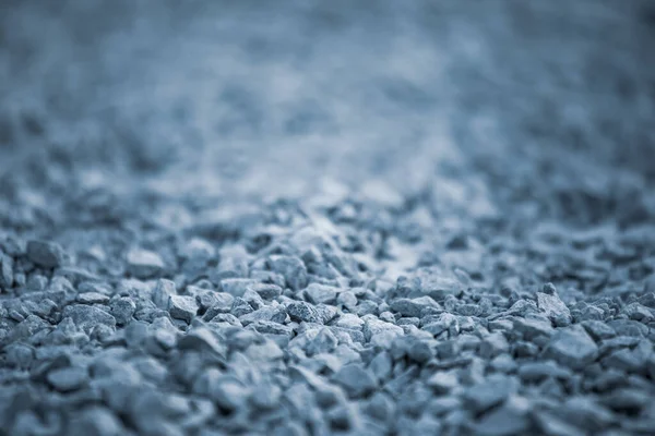 Fundo de seixos. Textura de seixos com um tom azul. Pedras decorativas. Piso de pedra azul no jardim. Pebbles azuis . — Fotografia de Stock