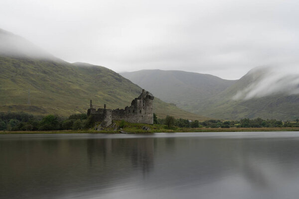 The ruins of historic Kilchurn Castle and view on Loch Awe