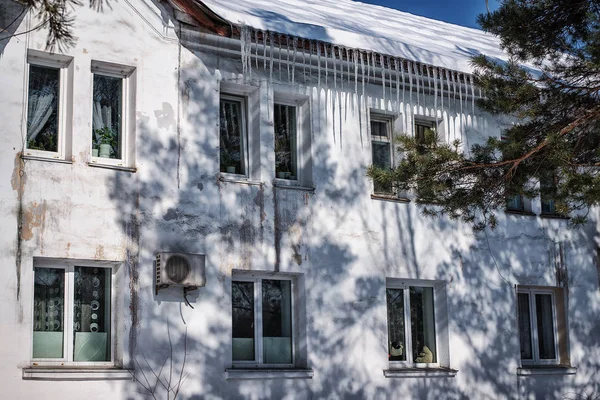 Long Icicles Hang Roof Building Blocking Windows — Stock Photo, Image