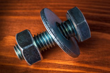 Ahşap arka planda metal cıvata ve fındık yapımında kullanılır.