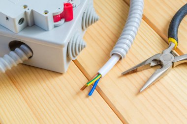 Junction box with wire and tool for repairing electrics in the house