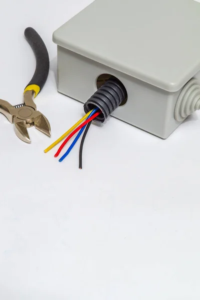 Junction box with wires for repairing electrics in house or office — 스톡 사진