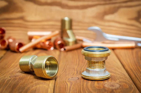 Set of brass fittings is often used for water and gas installations — Stock Photo, Image