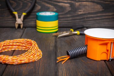 Electrical junction orange box with wires used in the electric installation process