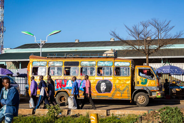 Nairobi, Kenya - December 9, 2016: Commuters using bus in capita