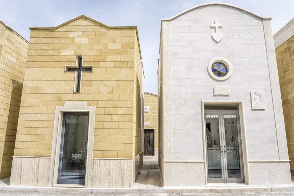 Modern cemetery with family graves in Italy