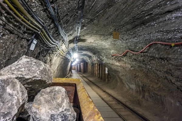 Raw salt block in industrial wagon underground — Stock Photo, Image