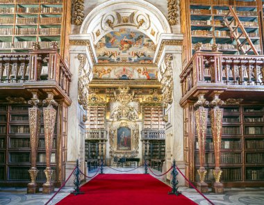 Interioir of library in historic University of Coimbra, Portugal clipart