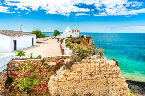 Small chapel on the end of peninsula called Nossa Senhora da Rocha what translates from Portuguese to Our lady of the rock, Algarve, Portugal