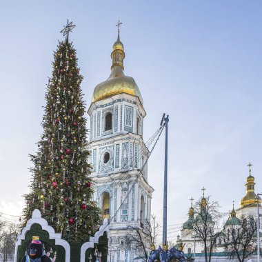 Christmas tree is set on Sofia Square in Kyiv, Ukraine. In the background you can see the temple of Sofia of Kyiv - the sights of the city.