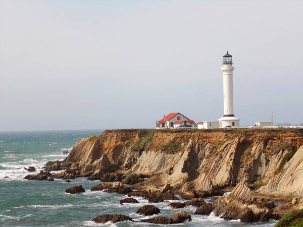 Pigeon Point Lighthouse on the California Coastal Cliffs  - Waves, Pacific Ocean and Horizon