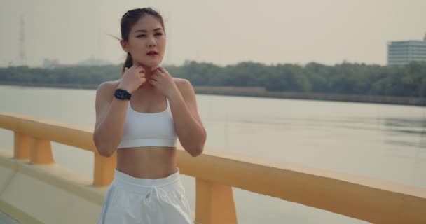 Slow Motion Woman Athlete Ready Run Using Watch Listening Music — Stock Video